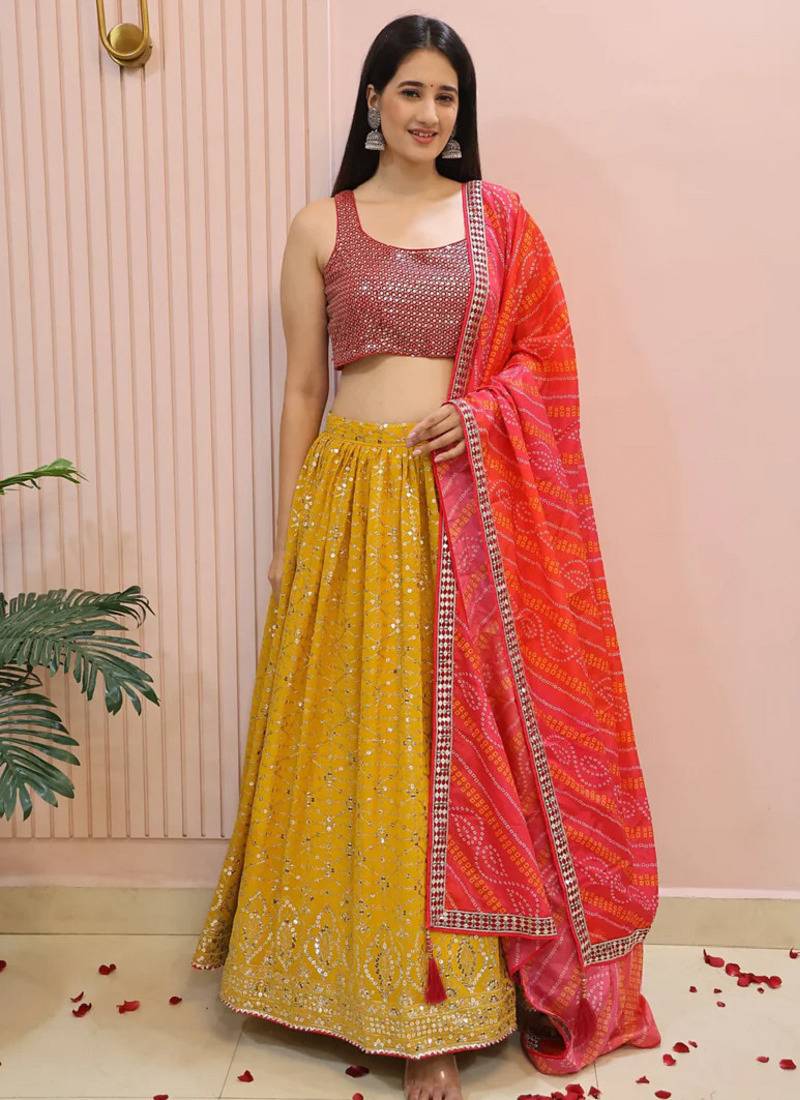 Yellow zari work georgette haldi lehenga with blouse