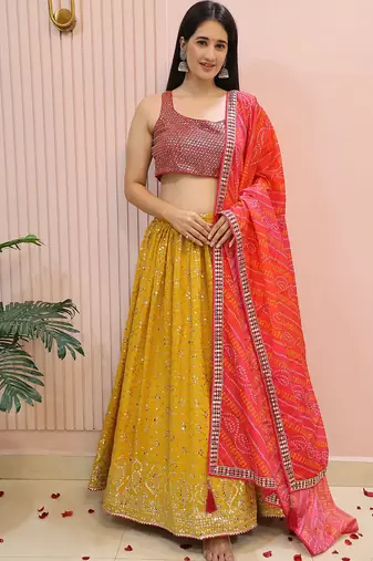 Yellow zari work georgette haldi lehenga with blouse