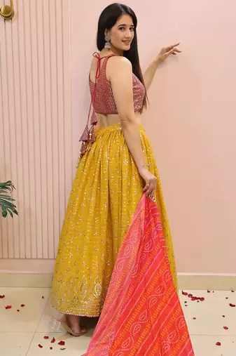 Yellow zari work georgette haldi lehenga with blouse