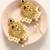 Traditional peacock needle ear cuff earrings