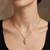 Gold plated cz leaf pendant with chain