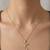 Gold plated cz layered butterfly pendant with chain