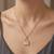 Gold plated cz lock pendant with chain