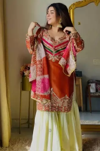 Orange satin silk embroidered kurti gharara set with printed tebby dupatta
