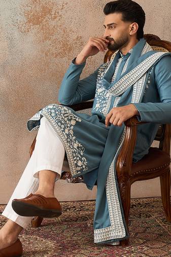 Men blue silk blend woven design floral straight kurta sets