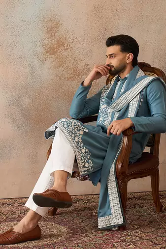 Men blue silk blend woven design floral straight kurta sets