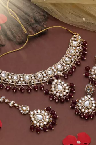Maroon color kundan necklace set