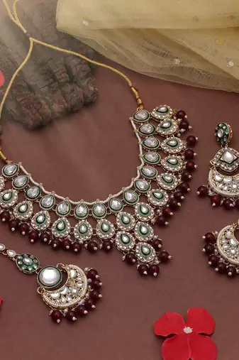 Maroon color kundan necklace set