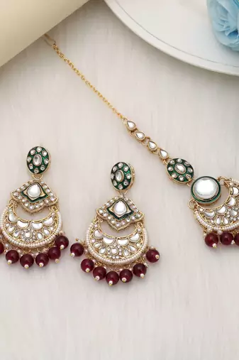 Maroon color kundan earrings tikka set