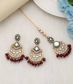 Maroon color kundan earrings tikka set