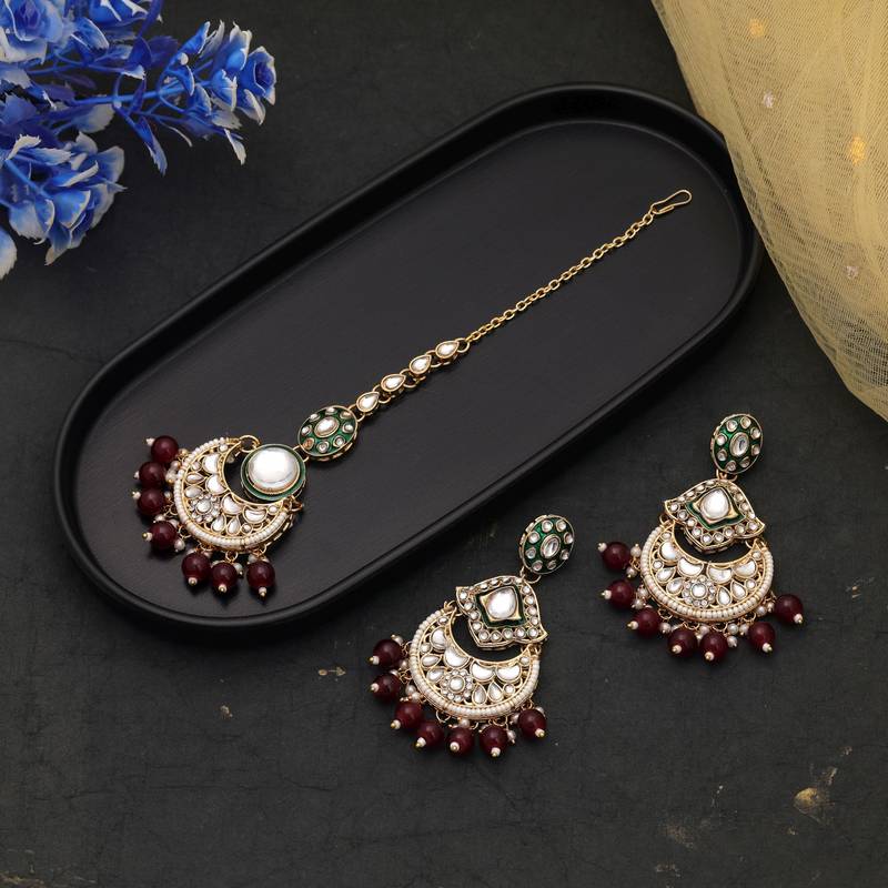 Maroon color kundan earrings tikka set