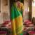 Green colour handloom cotton saree with contrast border & tassels