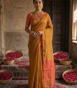 Brown colour handloom cotton saree with contrast border & tassels