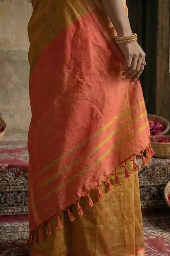 Brown colour handloom cotton saree with contrast border & tassels
