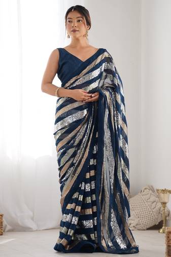 Teal colour heavy georgette sequin saree with blouse