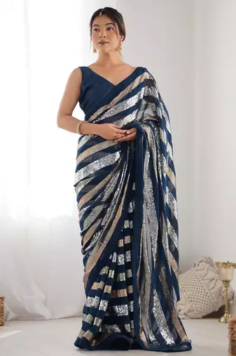 Teal colour heavy georgette sequin saree with blouse
