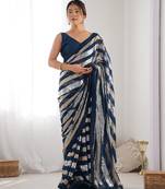 Teal colour heavy georgette sequin saree with blouse