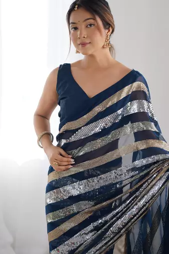 Teal colour heavy georgette sequin saree with blouse