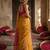 Gold colour handloom cotton saree with contrast border & tassels