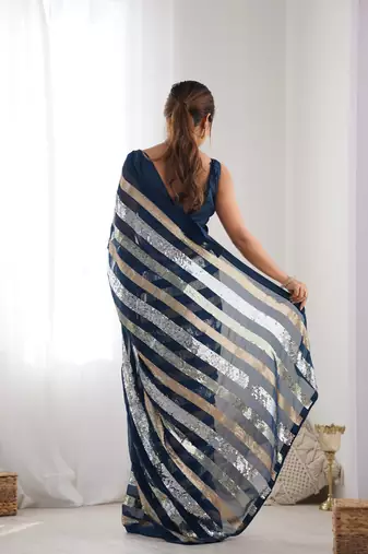 Teal colour heavy georgette sequin saree with blouse