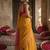 Gold colour handloom cotton saree with contrast border & tassels