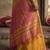 Gold colour handloom cotton saree with contrast border & tassels
