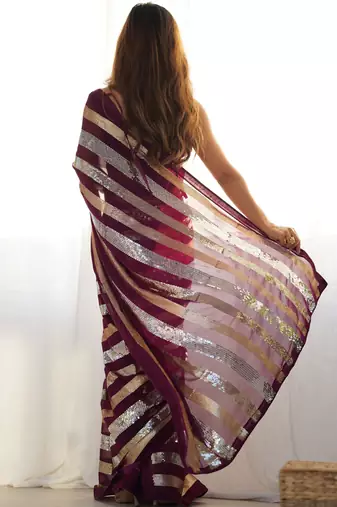 Wine colour heavy georgette sequin saree with blouse