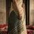 Beige colour handloom cotton saree with contrast border & tassels