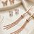 Wo  Set of 3 Rose-Gold-Plated Pear-Beaded Earrings