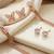 Wo  Set of 3 Rose-Gold-Plated Pear-Beaded Hoop Earrings