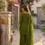 Green silk embroidered kurta with palazzo and dupatta set