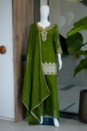 Green silk embroidered kurta with palazzo and dupatta set