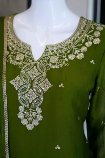 Green silk embroidered kurta with palazzo and dupatta set