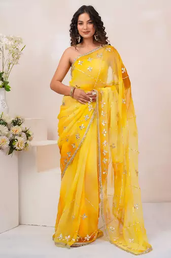 Yellow shaded georgette saree with gota patti jaal work