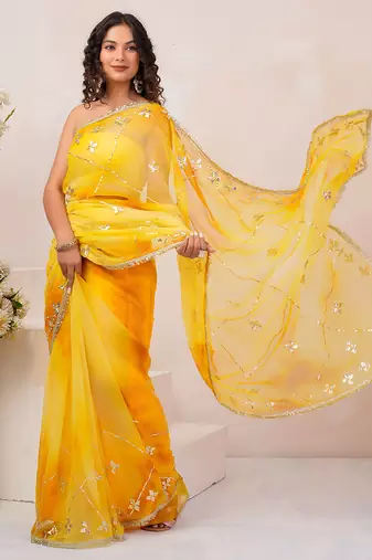 Yellow shaded georgette saree with gota patti jaal work