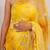 Yellow shaded georgette saree with gota patti jaal work