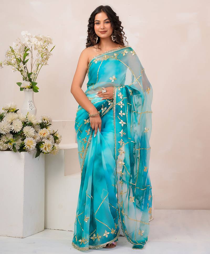 Turquoise blue shaded georgette saree with gota patti jaal work