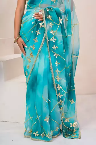 Turquoise blue shaded georgette saree with gota patti jaal work