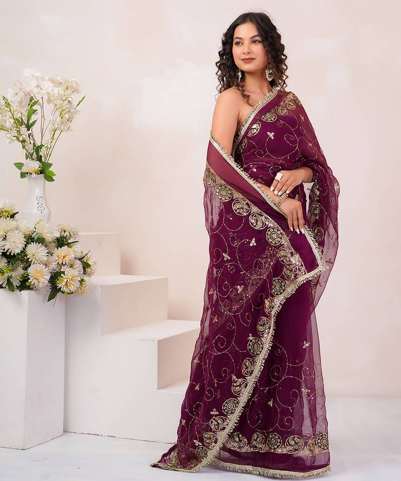 Wine georgette saree with aari & sequins work