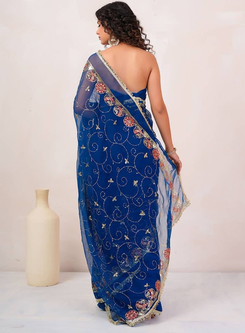 Blue georgette saree with aari & sequins work