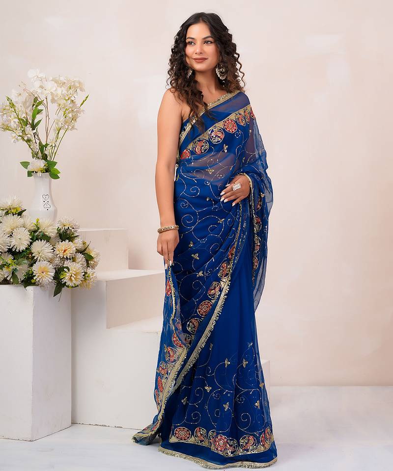 Blue georgette saree with aari & sequins work
