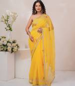 Yellow georgette saree with aari work