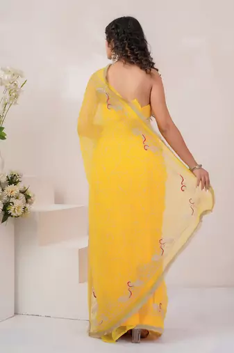 Yellow georgette saree with aari work
