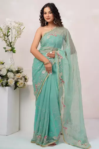 Teal blue georgette saree with aari work