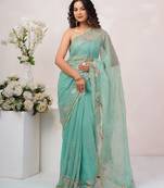 Teal blue georgette saree with aari work