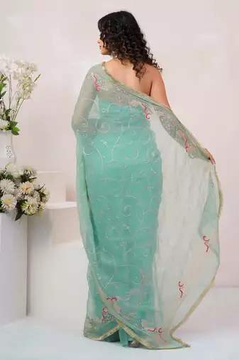 Teal blue georgette saree with aari work