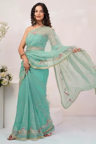 Teal blue georgette saree with aari work