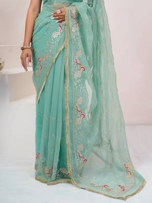 Teal blue georgette saree with aari work 5