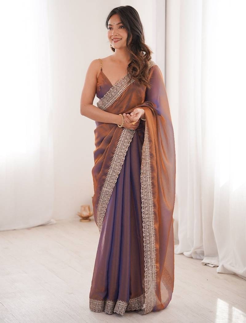 Copper colour fendy satin embroidered lace border saree