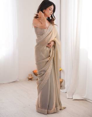 Beige colour fendy satin embroidered lace border saree 2